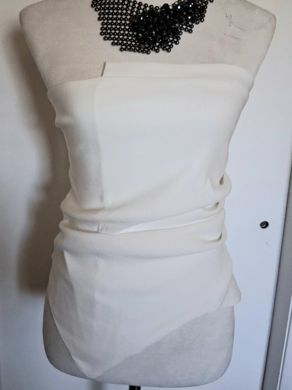 ZARA Strapless. Asymmetrical Draped Bandeau top. In oyster white. Overlay across